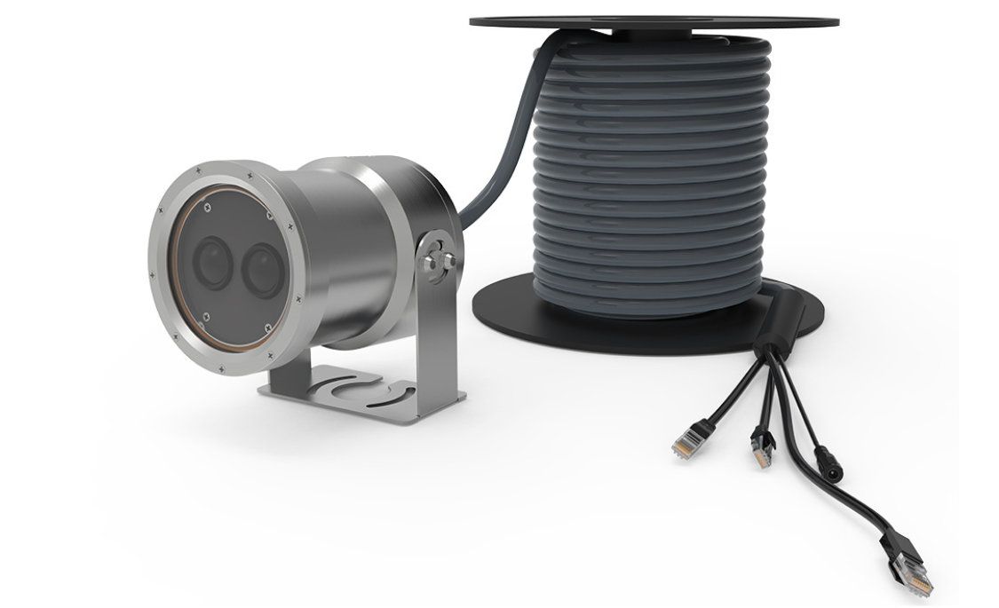 Engineer inspecting underwater camera housing sealing